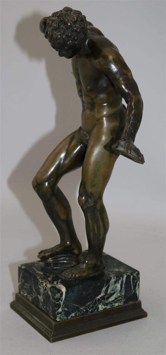 After the Antique. A 19th century bronze figure of a dancing faun, 12.75in.